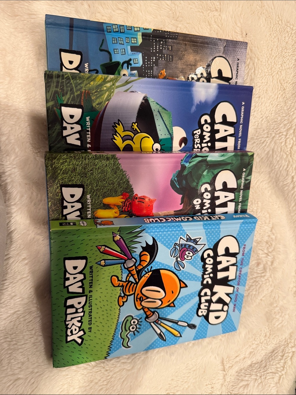 Cat Kid Comic Club Hardcover Book Set - Blue/Green/Purple set of 4 books